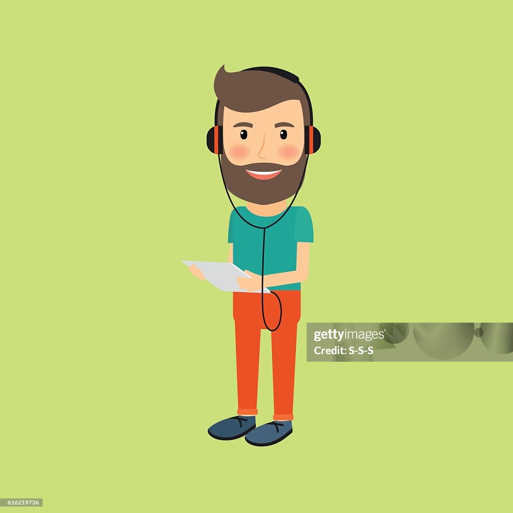 Hipster man with gadget and headphones