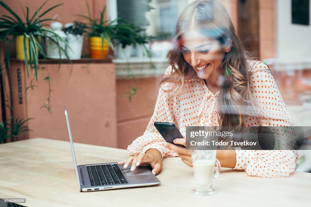 Young woman at the cafe