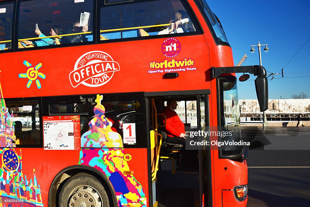 Two-storey tourist bus City Sightseeing on  street Varvarka