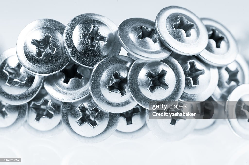 Many silver screw heads toned grey