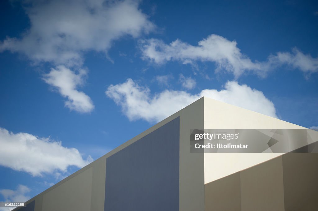 Blue sky with a corner part of modern building