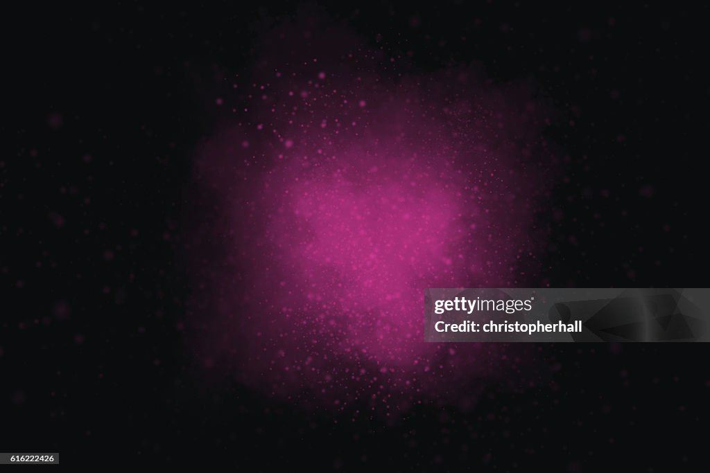 Colourful abstract powder explosion on a black background