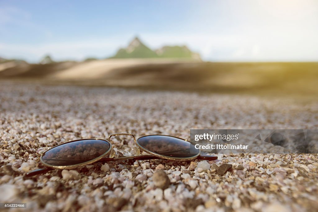 Vintage sunglasses put on a lot of broken small corals