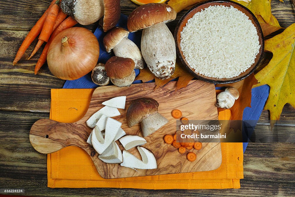 Ingredients for risotto with wild mushrooms boletus