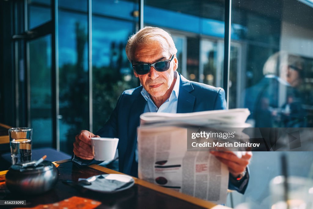 Businessman drinking coffee