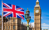 British flag, Big Ben and Houses of Parliament. London