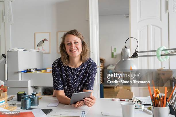 potrait of happy businesswoman with digital tablet - halle an der saale 個照片及圖片檔