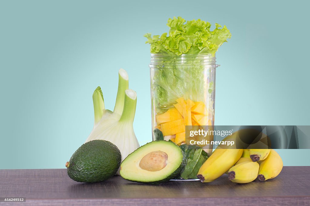 Avocado and banana smoothie ingredients in blender