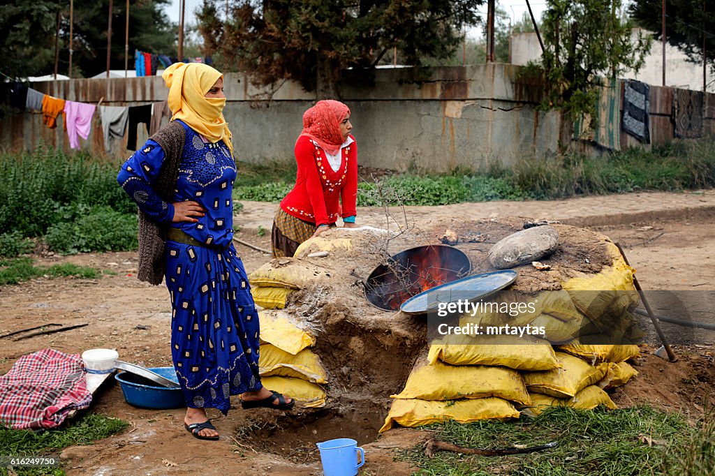 Syrian women making bread