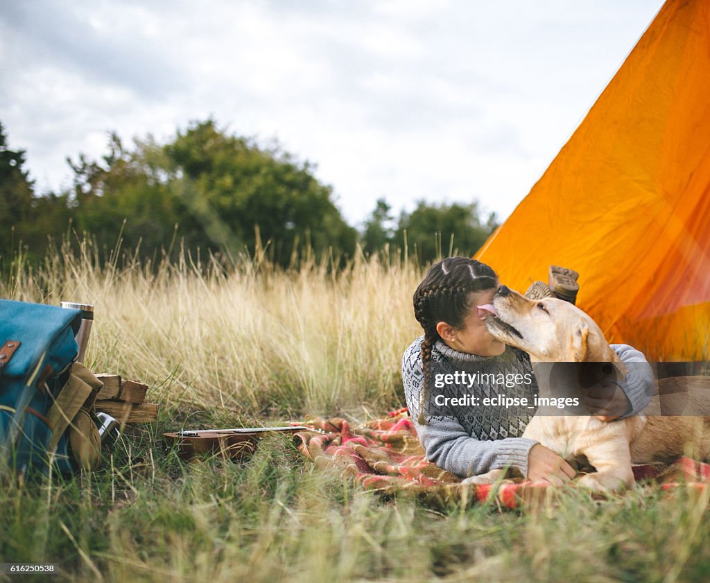 Camping and playing with dog