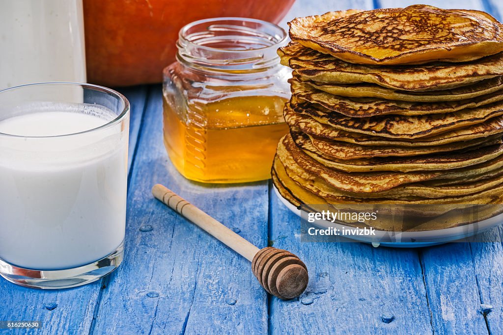 Pumpkin pancakes, milk and honey