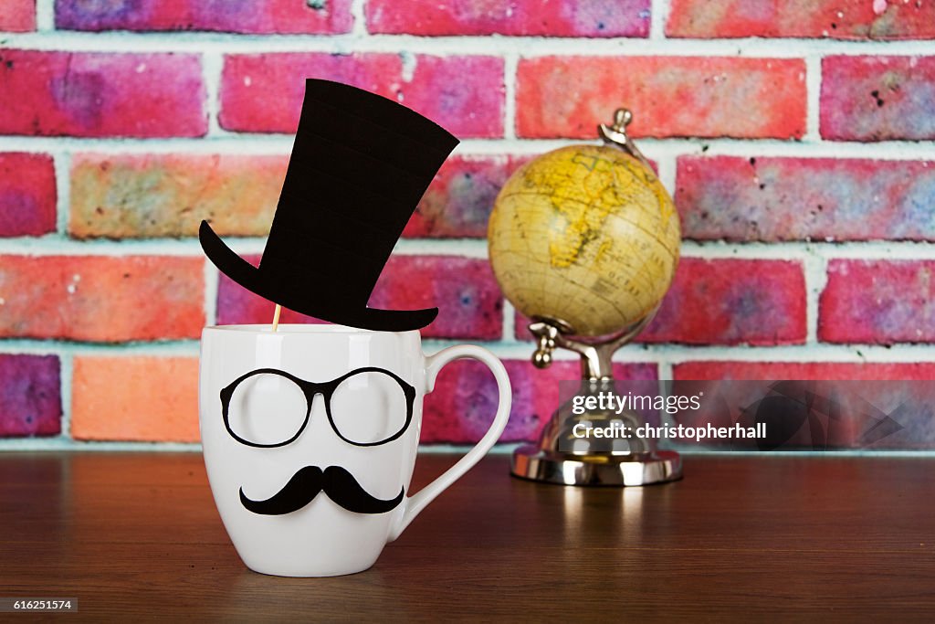 Coffee cup with a black hipster mustache