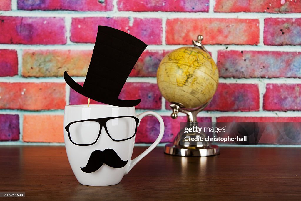 Coffee cup with a black hipster mustache