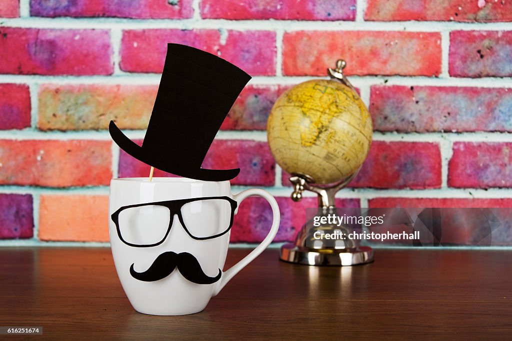 Coffee cup with a black hipster mustache