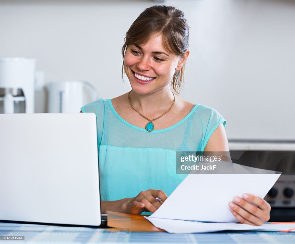 Adult girl applying for bank loan at home