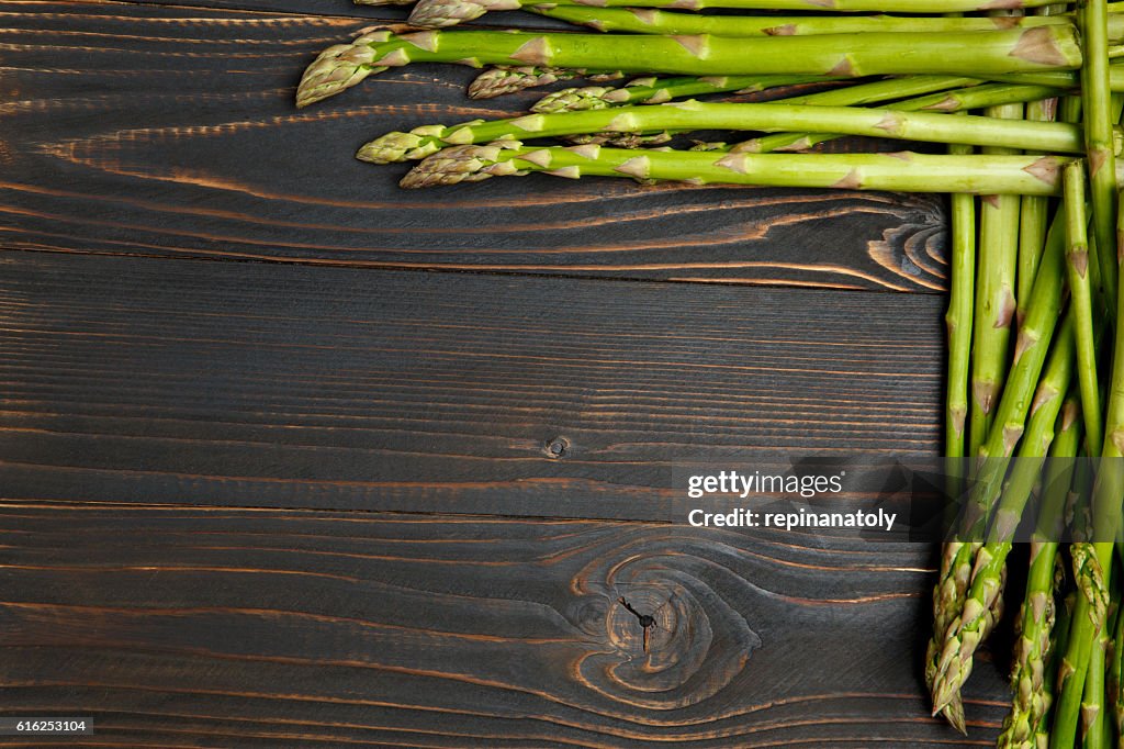 Harvested asparagus on wooden