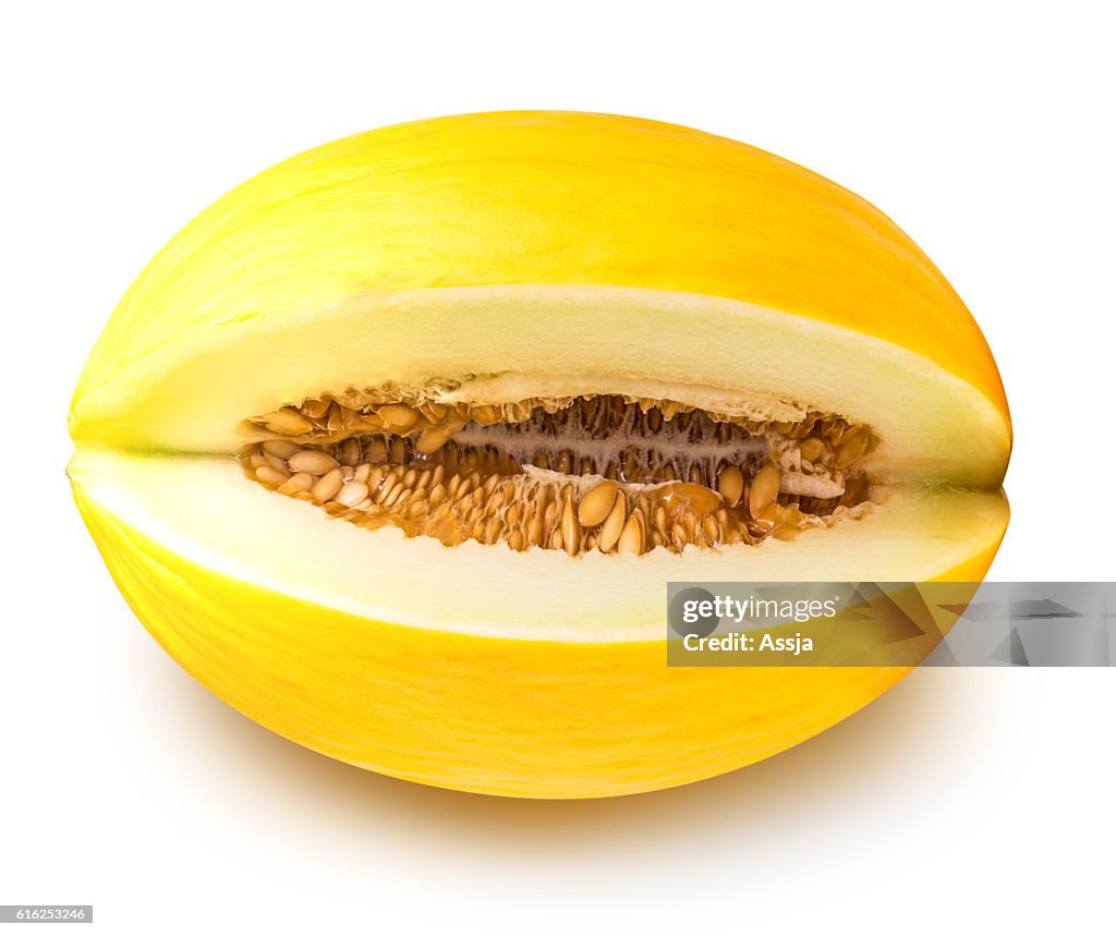 Gelbe essende Melone isoliert auf weißem Hintergrund