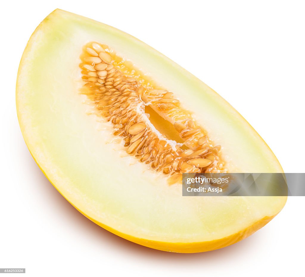 Yellow cut melon isolated on white background