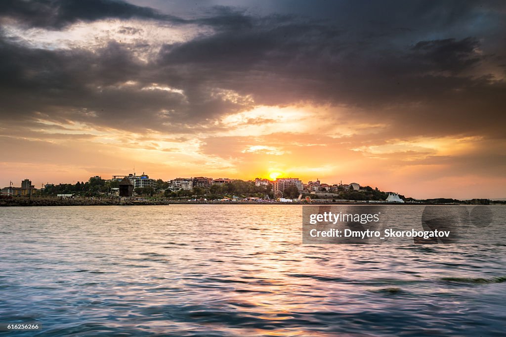 Sea shore with a sandy beach with island