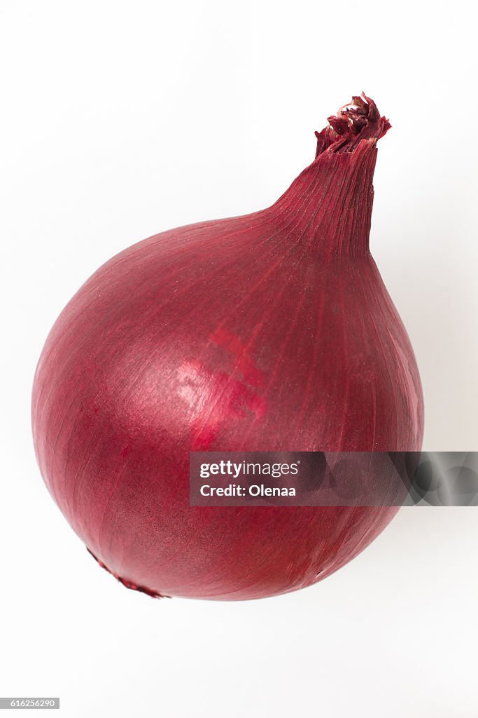 Head of red onion on a white background