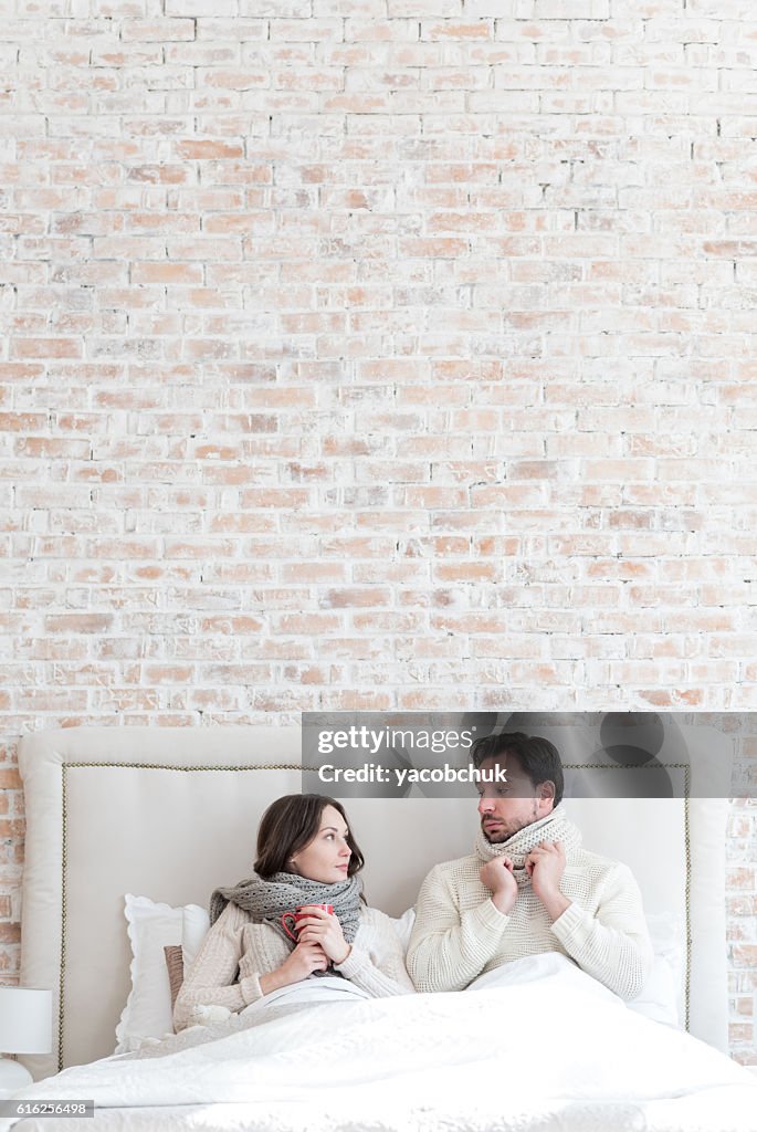 Pleasant young couple looking at each other