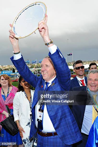 Part owner Peter Tighe poses with trophy after Winx won Race 9, William Hill Cox Plate during Cox Plate Day at Moonee Valley Racecourse on October...
