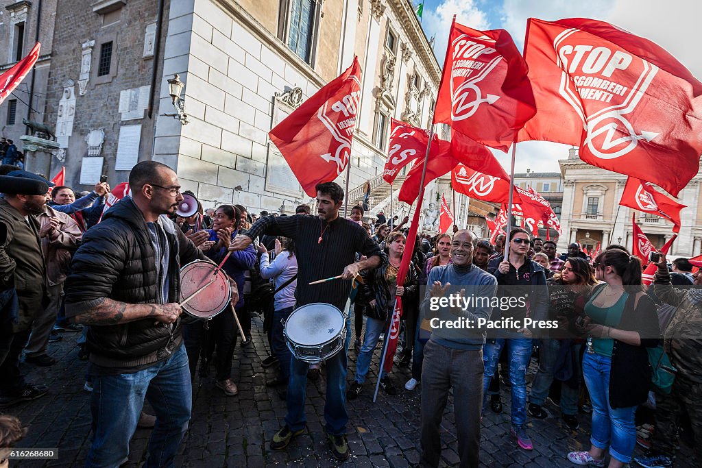 People wave flags and shout slogans during a demonstration,...