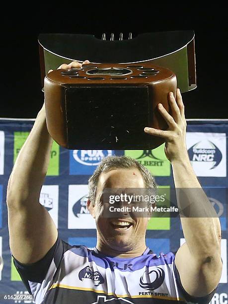 Spirit captain Heath Tessmann holds aloft the NRC trophy after victory in the 2016 NRC Grand Final match between the NSW Country Eagles and Perth...