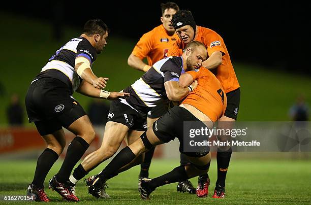 Rohan O'Reegan of the Eagles is tackled by Billy Meakes of the Spirit during the 2016 NRC Grand Final match between the NSW Country Eagles and Perth...