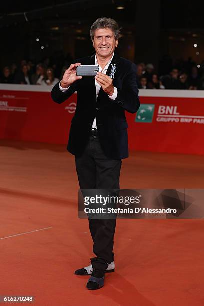 Gianni Ippoliti walks a red carpet for '7 Minuti' during the 11th Rome Film Festival at Auditorium Parco Della Musica on October 21, 2016 in Rome,...