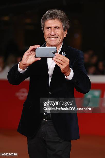 Gianni Ippoliti walks a red carpet for '7 Minuti' during the 11th Rome Film Festival at Auditorium Parco Della Musica on October 21, 2016 in Rome,...