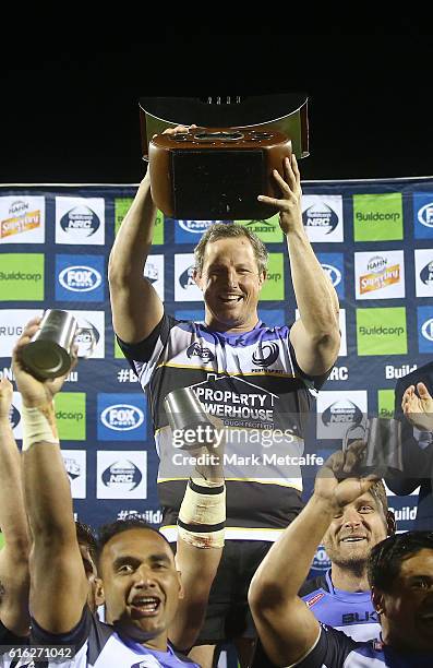 Spirit captain Heath Tessmann holds aloft the NRC trophy after victory in the 2016 NRC Grand Final match between the NSW Country Eagles and Perth...