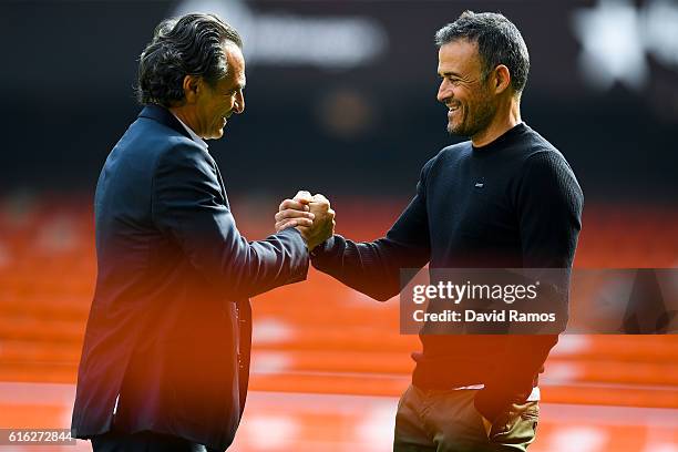 Head coach Cesare Prandelli of Valencia CF and Head coach Luis Enrique of FC Barcelona shake hands prior to the La Liga match between Valencia CF and...