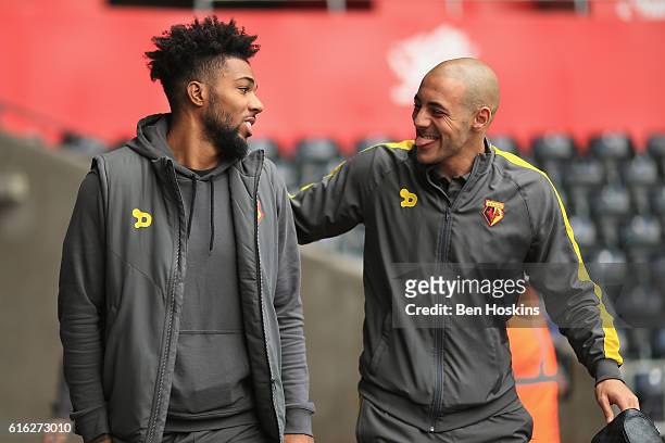 Jerome Sinclair of Watford and Nordin Amrabat of Watford arrive at the stadiium prior to kick off during the Premier League match between Swansea...
