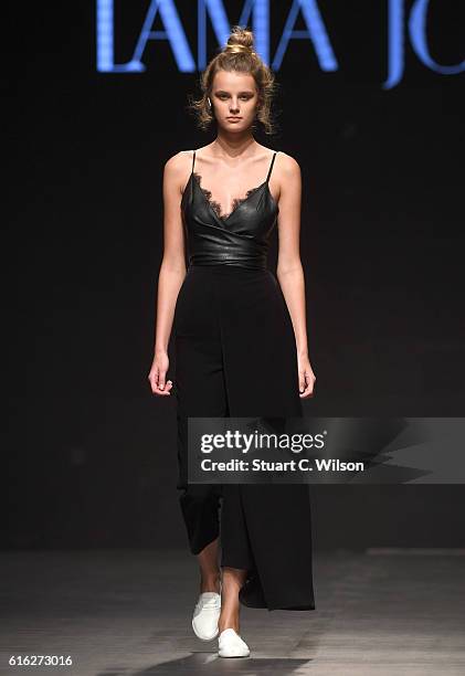 Model walks the runway during the Lama Jouni show at Fashion Forward Spring/Summer 2017 held at the Dubai Design District on October 22, 2016 in...