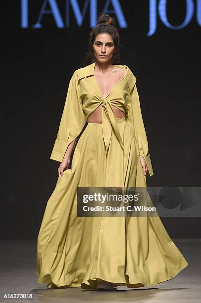 Model walks the runway during the Lama Jouni show at Fashion Forward Spring/Summer 2017 held at the Dubai Design District on October 22, 2016 in...