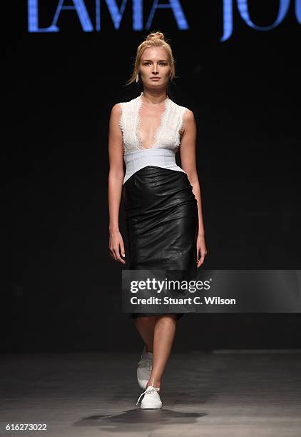 Model walks the runway during the Lama Jouni show at Fashion Forward Spring/Summer 2017 held at the Dubai Design District on October 22, 2016 in...