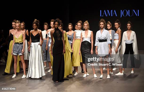 Models pose at the runway during the Lama Jouni show at Fashion Forward Spring/Summer 2017 held at the Dubai Design District on October 22, 2016 in...