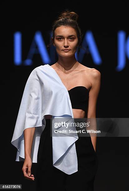 Model walks the runway during the Lama Jouni show at Fashion Forward Spring/Summer 2017 held at the Dubai Design District on October 22, 2016 in...