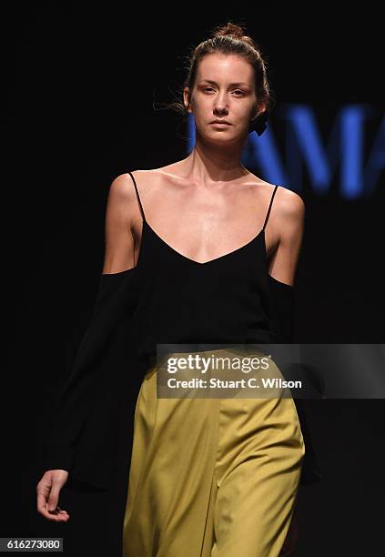 Model walks the runway during the Lama Jouni show at Fashion Forward Spring/Summer 2017 held at the Dubai Design District on October 22, 2016 in...