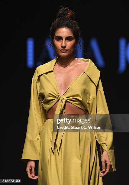 Model walks the runway during the Lama Jouni show at Fashion Forward Spring/Summer 2017 held at the Dubai Design District on October 22, 2016 in...