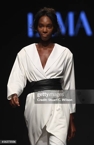 Model walks the runway during the Lama Jouni show at Fashion Forward Spring/Summer 2017 held at the Dubai Design District on October 22, 2016 in...