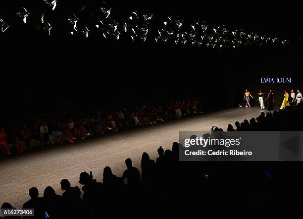 Models walk the runway during the Lama Jouni show at Fashion Forward Spring/Summer 2017 held at the Dubai Design District on October 22, 2016 in...