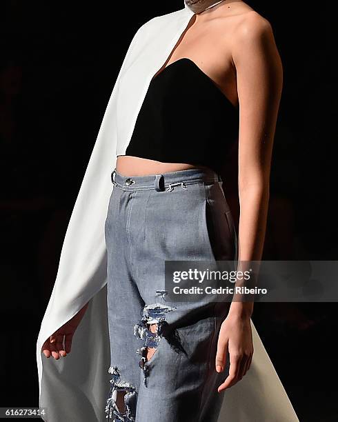 Model, dress detail, walks the runway during the Lama Jouni show at Fashion Forward Spring/Summer 2017 held at the Dubai Design District on October...