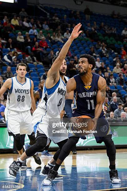 Ricky Rubio of the Minnesota Timberwolves guards against Mike Conley of the Memphis Grizzlies during the preseason game on October 19, 2016 at Target...