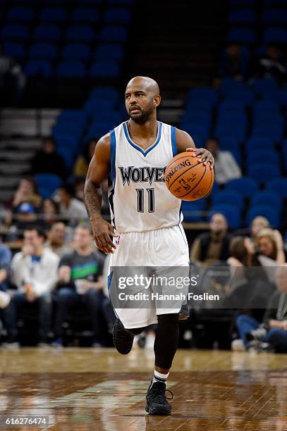John Lucas III of the Minnesota Timberwolves brings the ball down court against the Memphis Grizzlies during the preseason game on October 19, 2016...