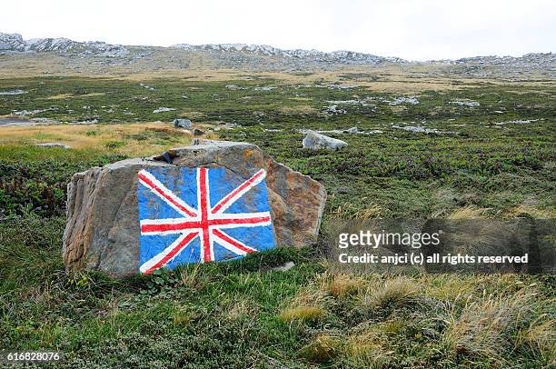 union flag painted on a rock, east falkland / falkland islands - falklands war stock pictures, royalty-free photos & images