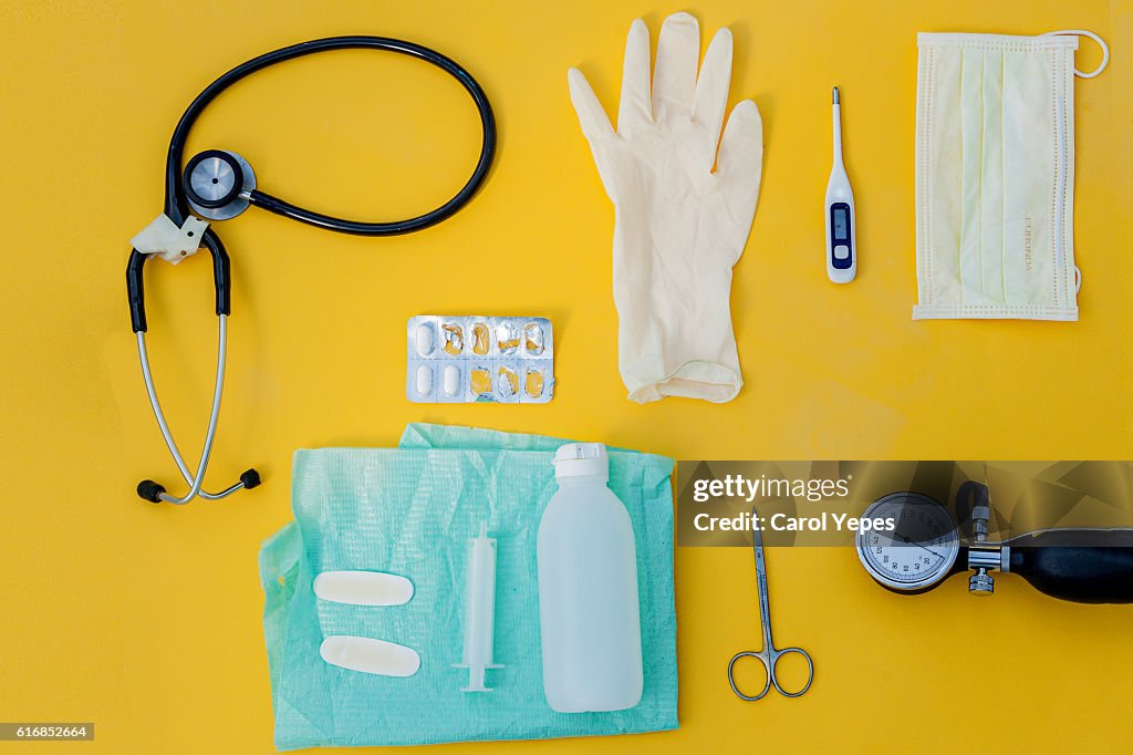 Doctor table with medical items. Flat lay