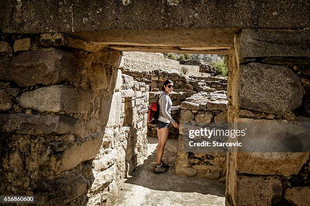 young woman at inca ruins in peru - ollantaytambo fortress - machu pichu stock pictures, royalty-free photos & images