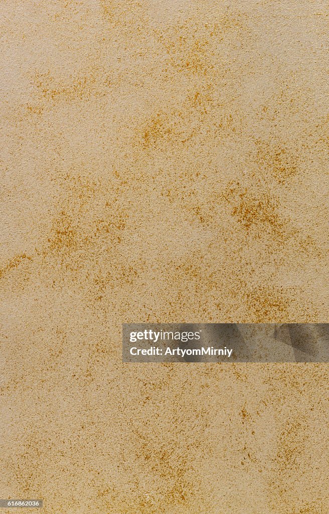 Background texture of a matt structure with a warm tint.